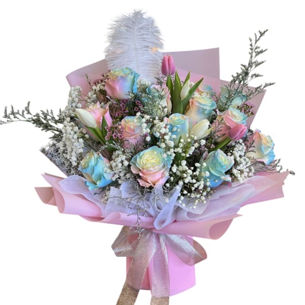 Pastel bouquet of roses and tulips wrapped in pink paper