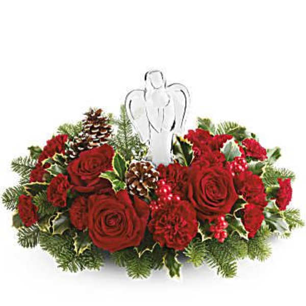 Red rose centerpiece with an angel figurine and pinecones