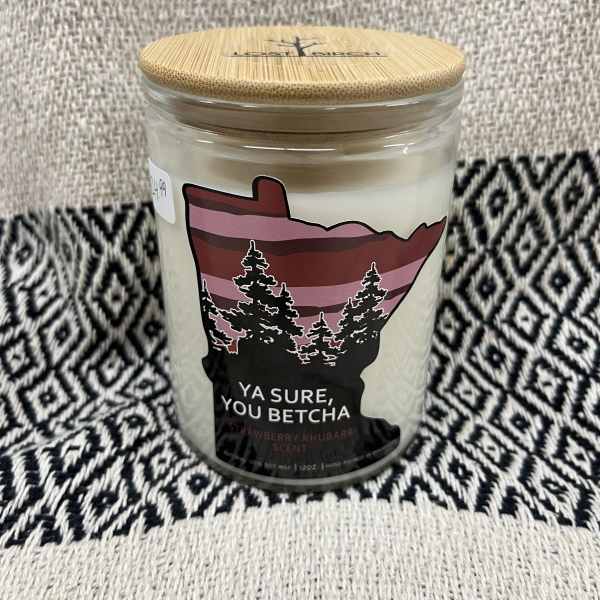 Scented candle in a glass jar with a bamboo lid