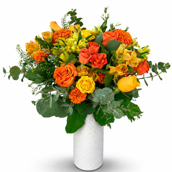 Orange and yellow mixed bouquet in a white textured vase