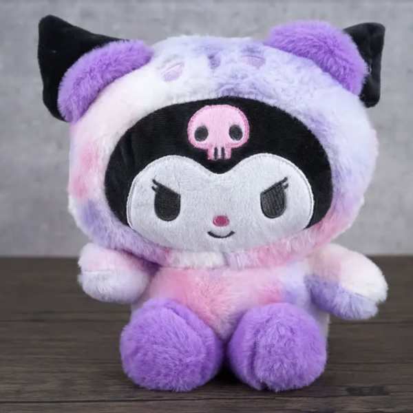 Plush character toy in a purple, pink, and black hooded outfit