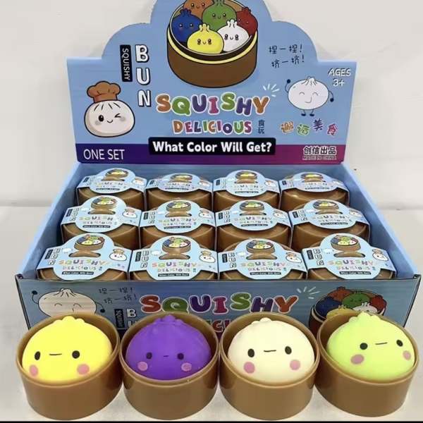 Display box of colorful squishy toy buns in round containers