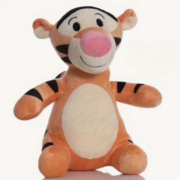 Plush Tigger stuffed animal sitting upright on a white background
