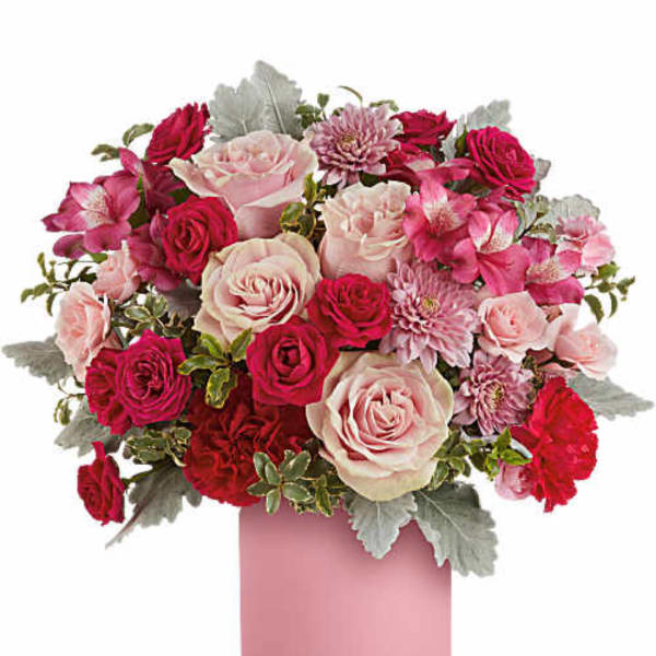 Pink and red rose bouquet in a pink vase