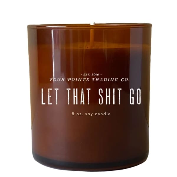 Brown glass candle jar with printed label