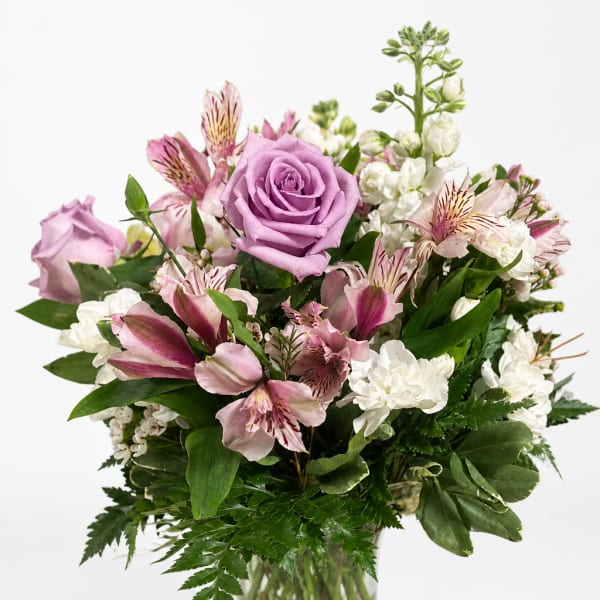 Lavender roses and pink alstroemeria in a mixed bouquet