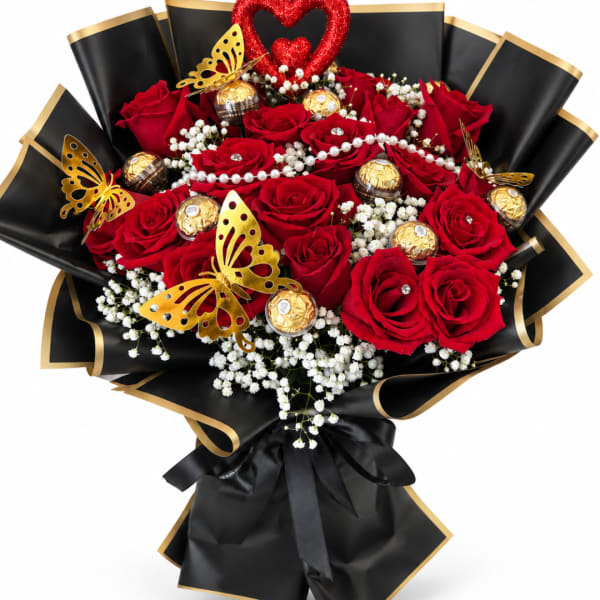 Bouquet of red roses with white baby's breath, gold chocolates, and butterfly accents