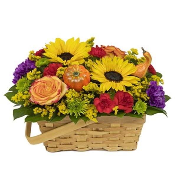 Basket of mixed flowers with sunflowers and roses