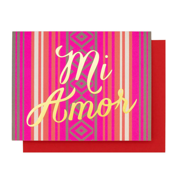 Decorative card with "Mi Amor" in gold script on a pink striped background