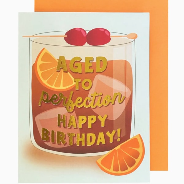 Birthday card with a cocktail glass and orange slices