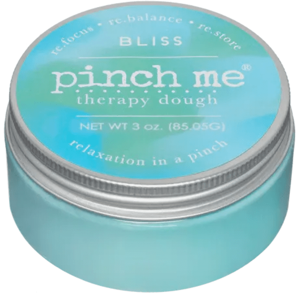 A turquoise tin labeled "pinch me" therapy dough