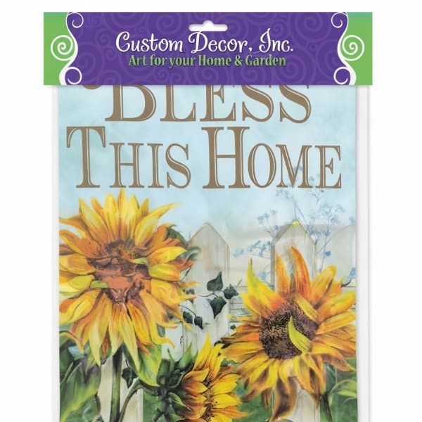 Decorative sign with sunflowers and the words "Bless This Home"