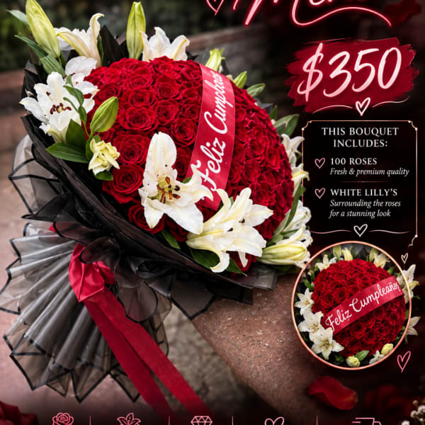 Large bouquet of red roses and white lilies wrapped in black paper with a red ribbon.