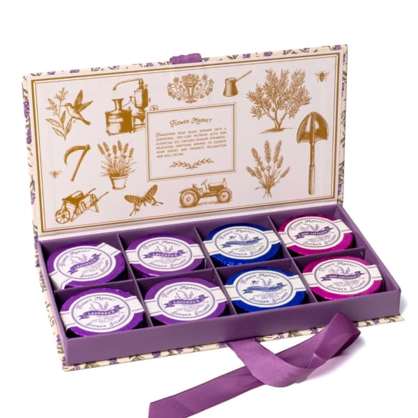 Boxed set of lavender shower steamers with a purple ribbon