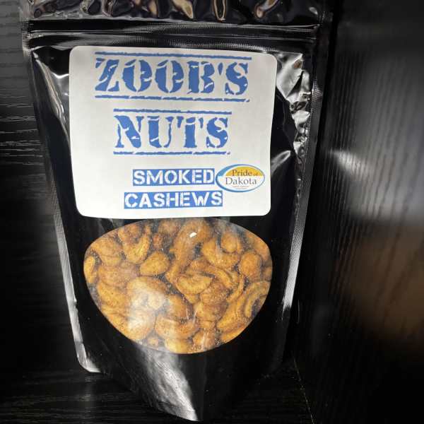Bag of smoked cashews with a clear window and blue label
