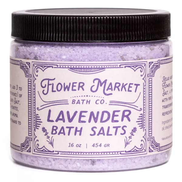 Jar of lavender bath salts with a black lid