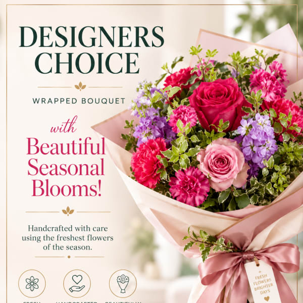 Wrapped bouquet of pink and purple flowers with roses and carnations