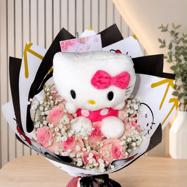 Hello Kitty plush bouquet with pink roses and baby's breath