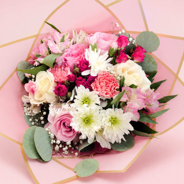 Pink and white mixed bouquet with roses, carnations, and daisies