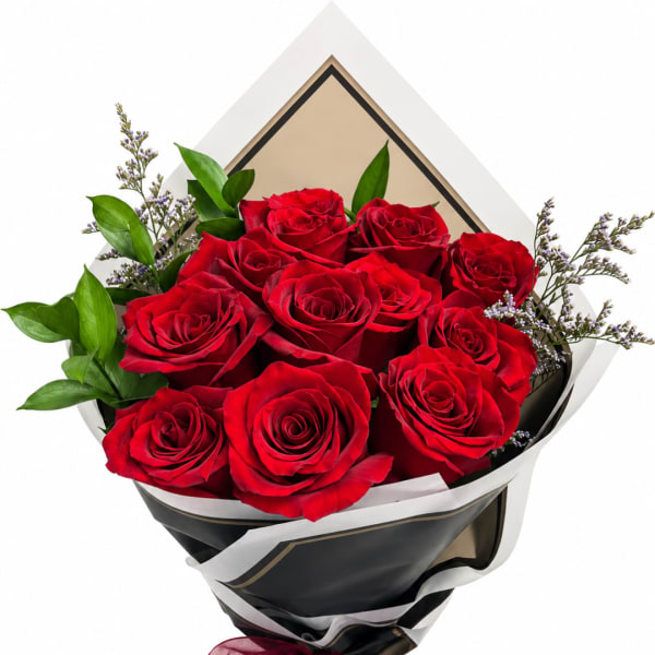 Bouquet of red roses with green foliage in black and white wrap