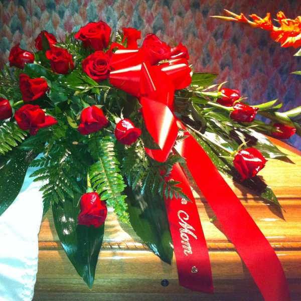 Bouquet of red roses with a red ribbon