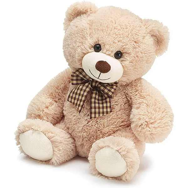 Plush teddy bear with a plaid bow on a white background