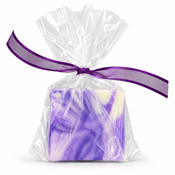 Wrapped purple and white soap bar tied with a purple ribbon