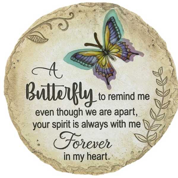 Round memorial plaque with a butterfly and remembrance message