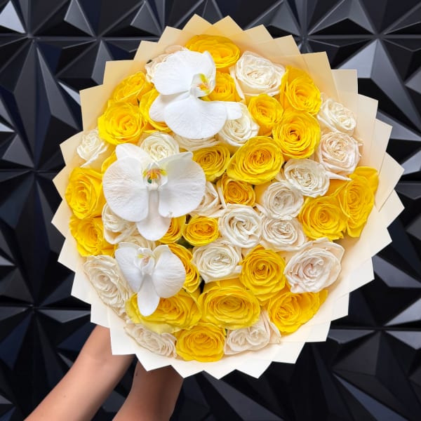 Yellow and white rose bouquet with white orchids