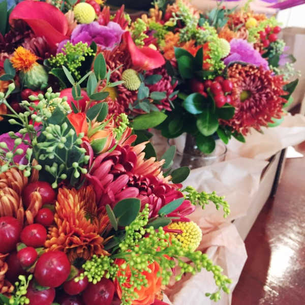 Colorful mixed flower bouquets with chrysanthemums and calla lilies