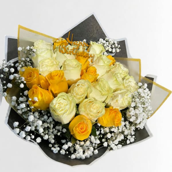 Yellow and white rose bouquet with baby's breath and a birthday topper