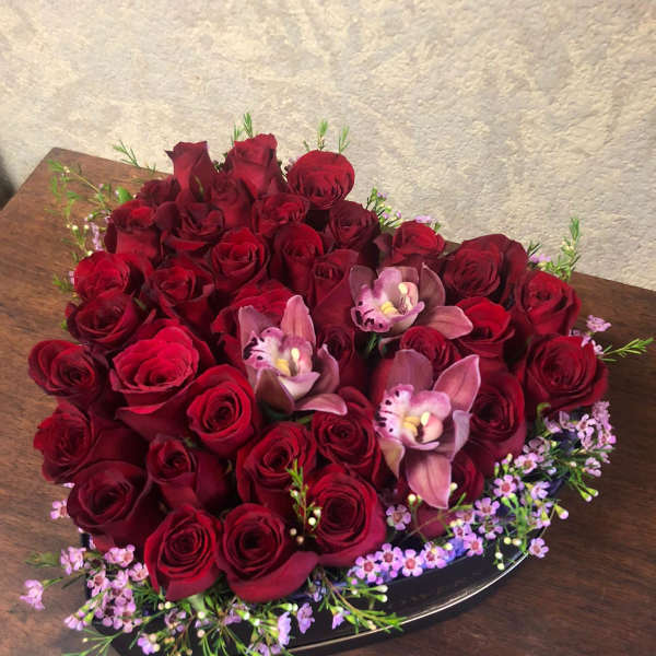 Heart-Shaped box with Red Roses *displaying premium picture*