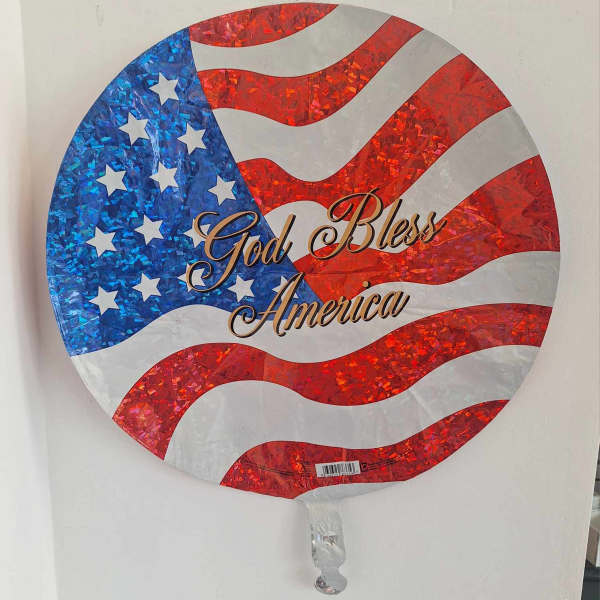 Round American flag balloon with "God Bless America" text