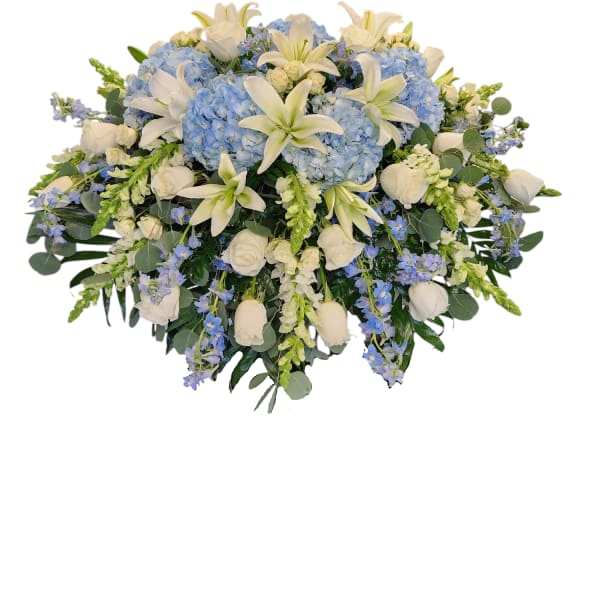 Blue hydrangea and white lily bouquet with roses and greenery