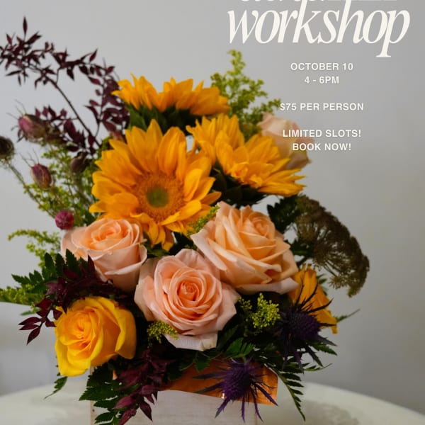 Sunflower and rose arrangement in a white box with autumn workshop text overlay.