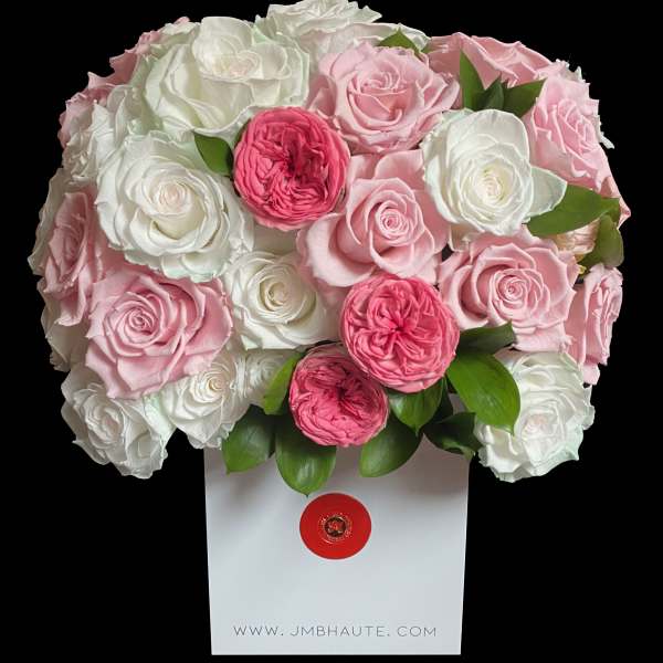 Pink and white rose bouquet in a white gift box