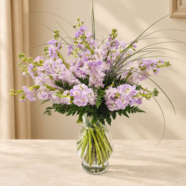 Lavender flowers arranged in a clear glass vase