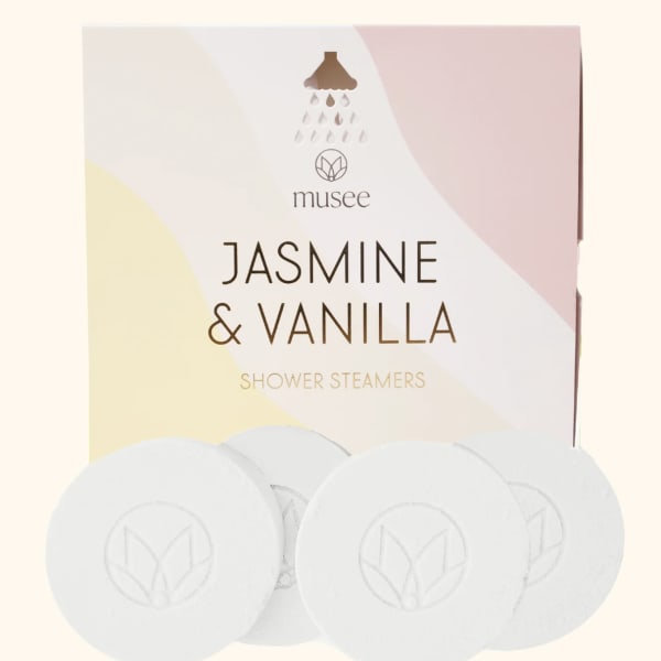 Box of jasmine and vanilla shower steamers with round white tablets
