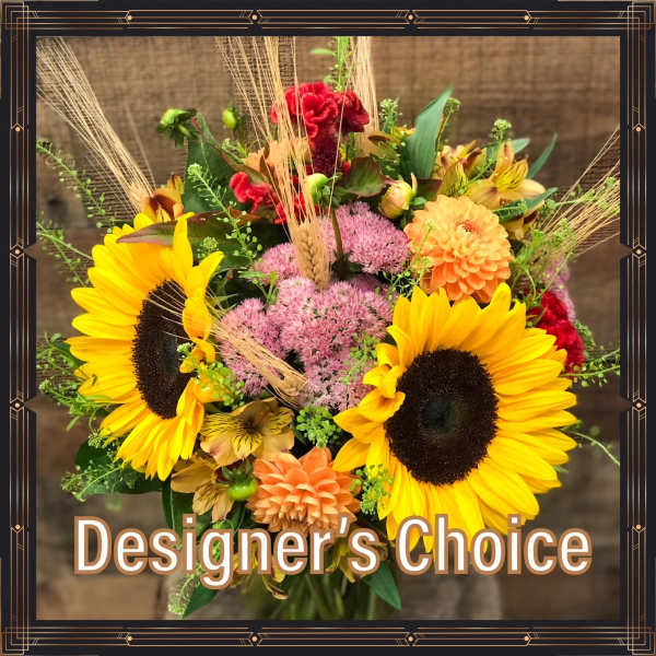 Mixed bouquet with sunflowers, dahlias, and pink filler flowers