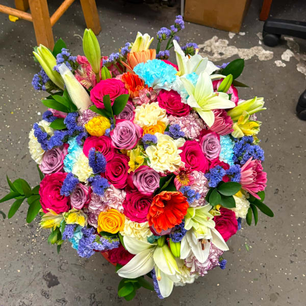 Colorful bouquet with roses, lilies, and carnations
