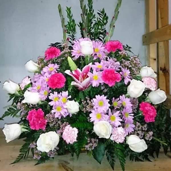 Large pink and white floral spray with lilies and daisies