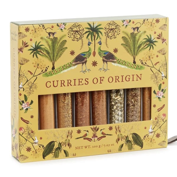 Boxed set of curry spice blends with a yellow illustrated package