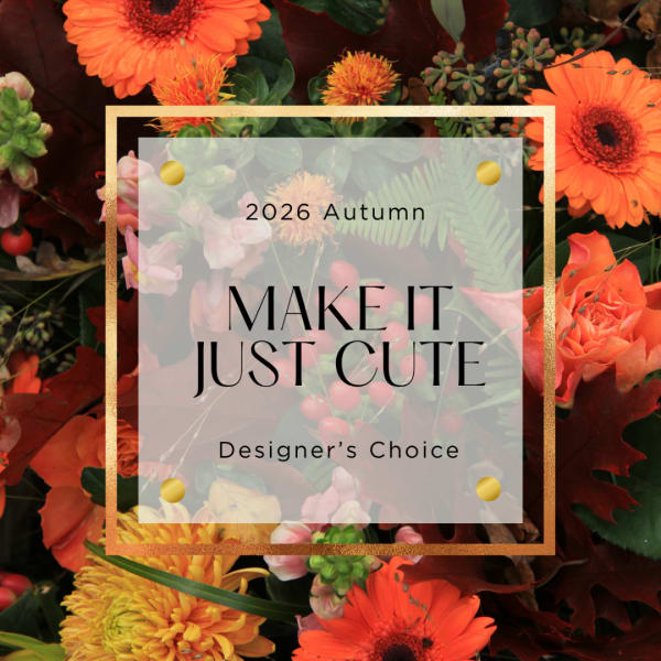 Autumn floral arrangement with orange gerbera daisies and roses