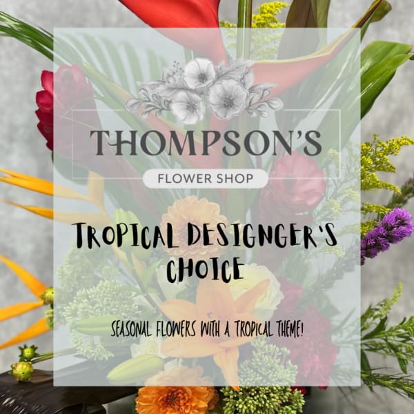 Tropical mixed bouquet with lilies and bright seasonal flowers