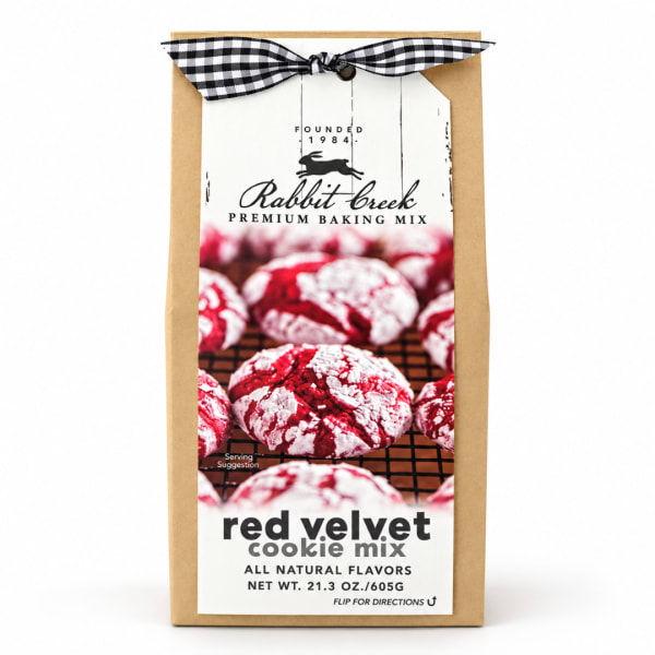 Red velvet cookie mix in a kraft paper bag with a black-and-white ribbon