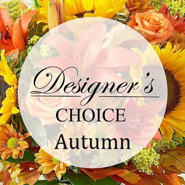Autumn flower arrangement with sunflowers, roses, and orange lilies