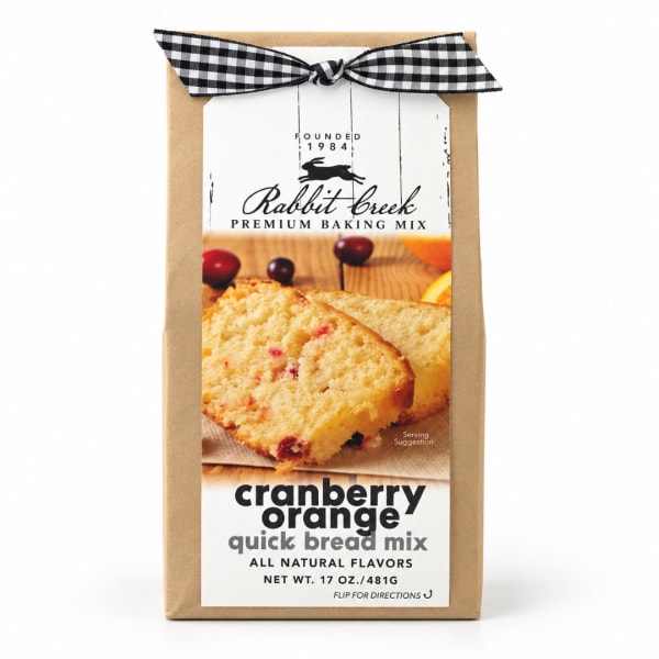 Bag of cranberry orange quick bread mix with a black-and-white ribbon