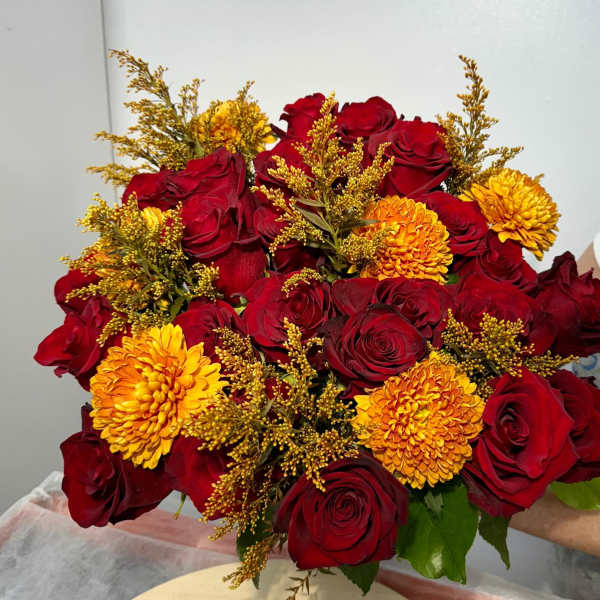 Bouquet of red roses and yellow chrysanthemums