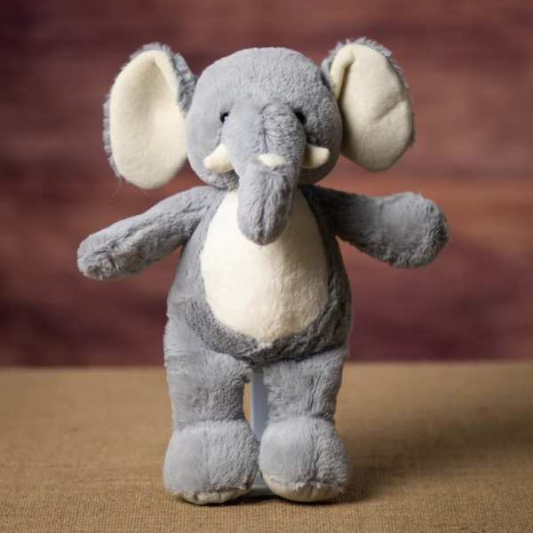 Gray plush elephant toy with cream ears and belly