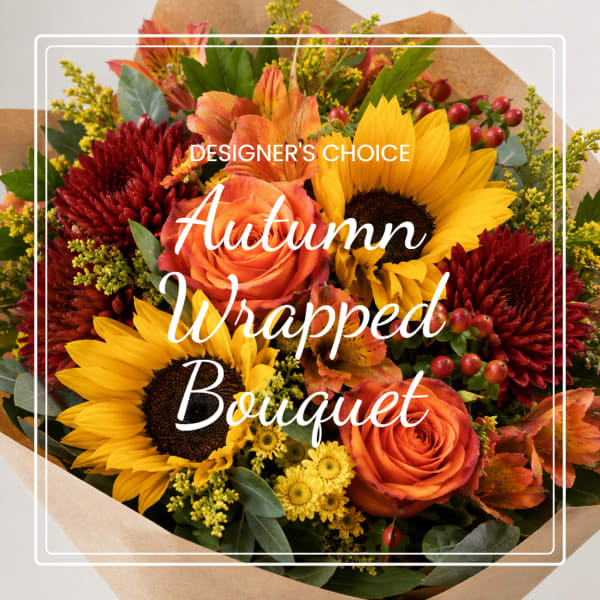Autumn bouquet with sunflowers, orange roses, and red mums